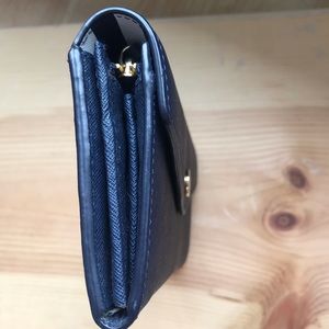 Michael Kors navy wallet with gold features